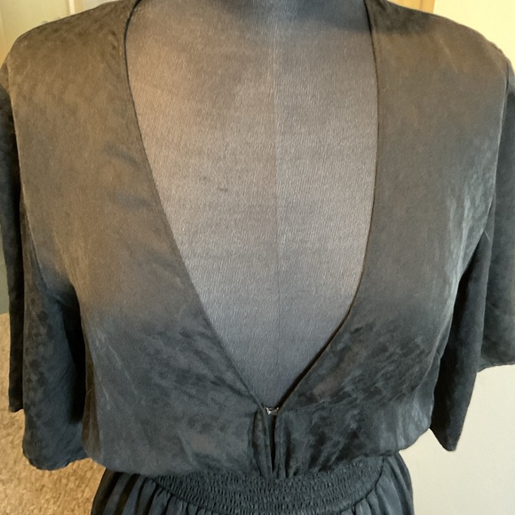 21. Reformation Black Jumpsuit with Sophisticated Wide-Leg Style Size 10 - Picture 11 of 13